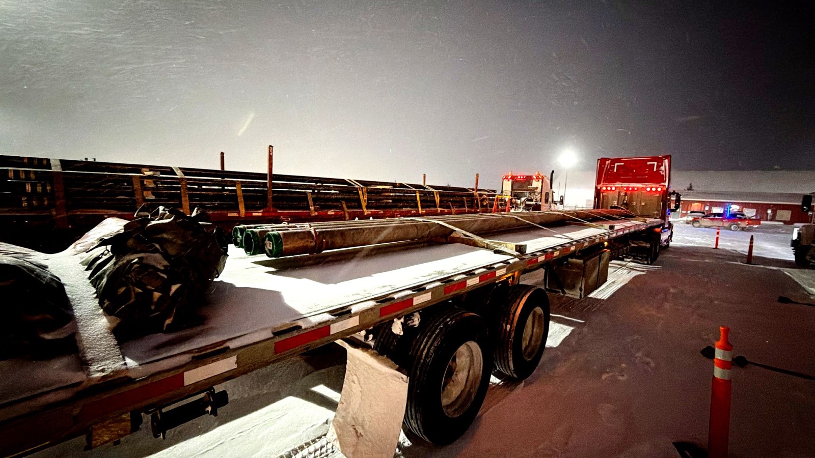 Flatbed steel load at night