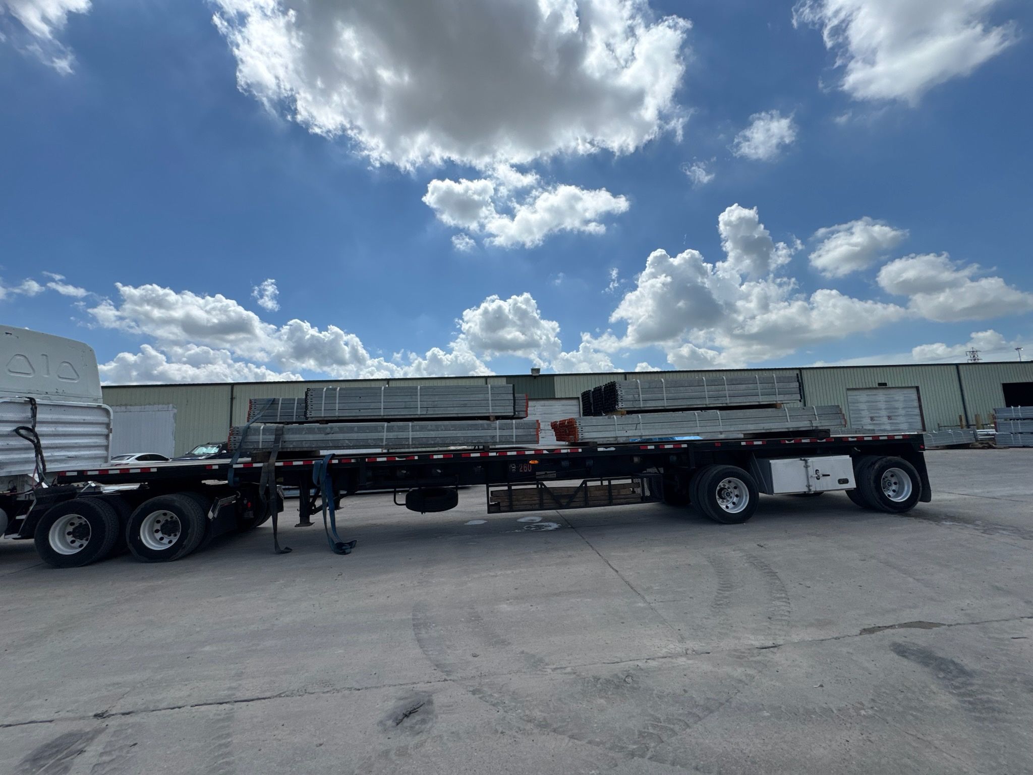 Loaded flatbed freight secured and ready for active Houston dispatch