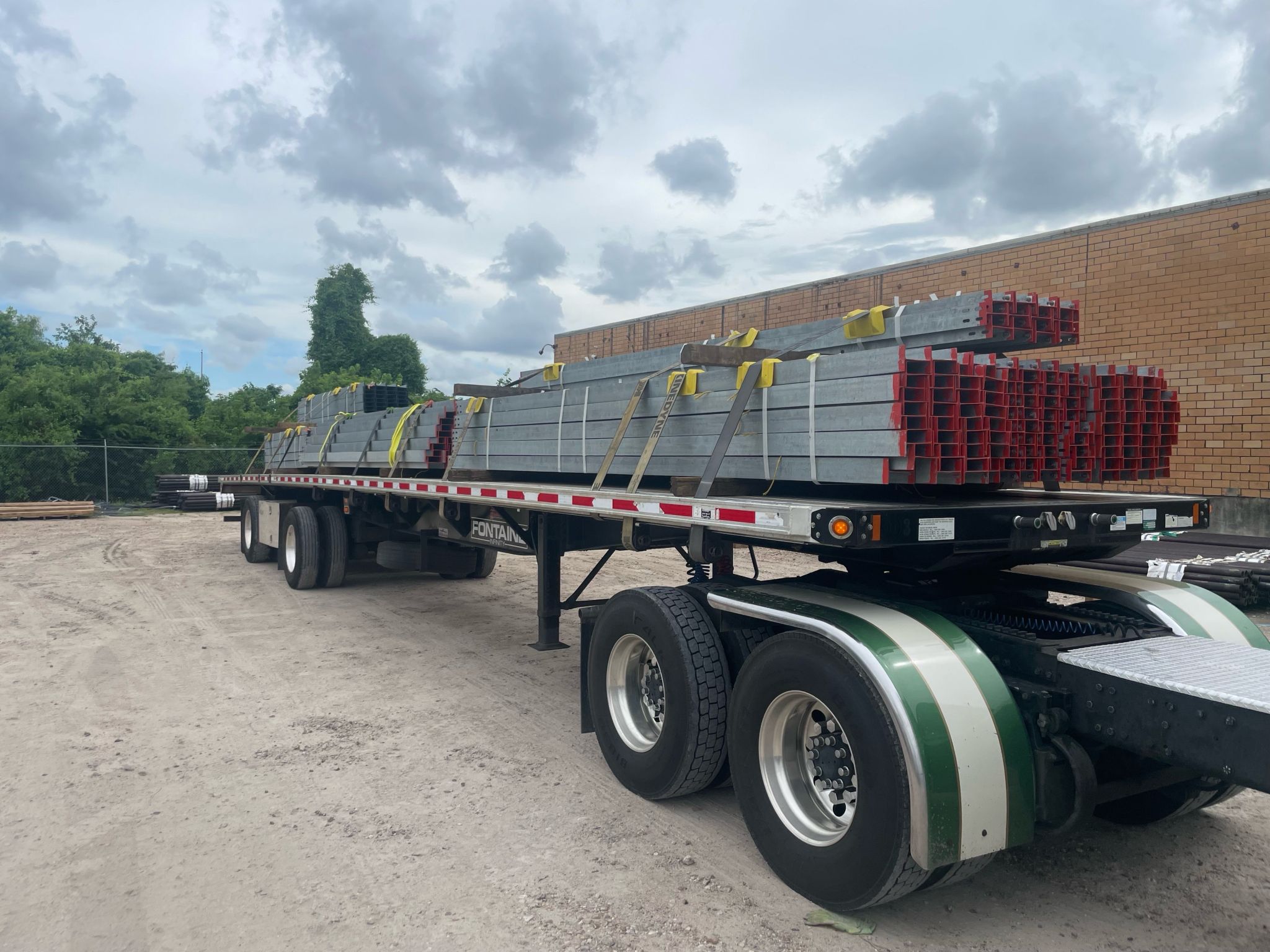 Active flatbed load en route — UR Freight 365 freight in motion